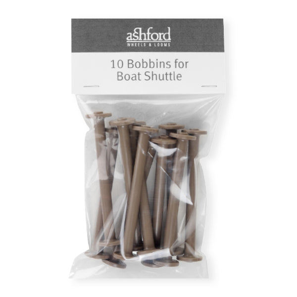 Pack of 10 Ashford Boat Shuttle Bobbins in clear plastic packaging with labeled header card, suitable for standard or XL weaving shuttles.