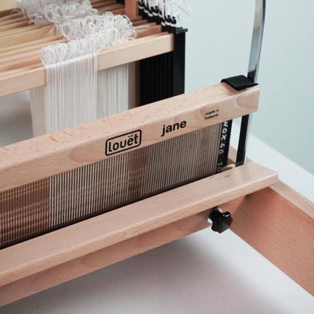 the Louet Jane shuttle race seen already installed on the Louet Jane 50 cm loom