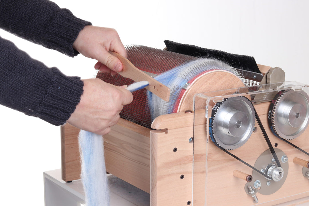 Using a yarn diz to create spinning sliver