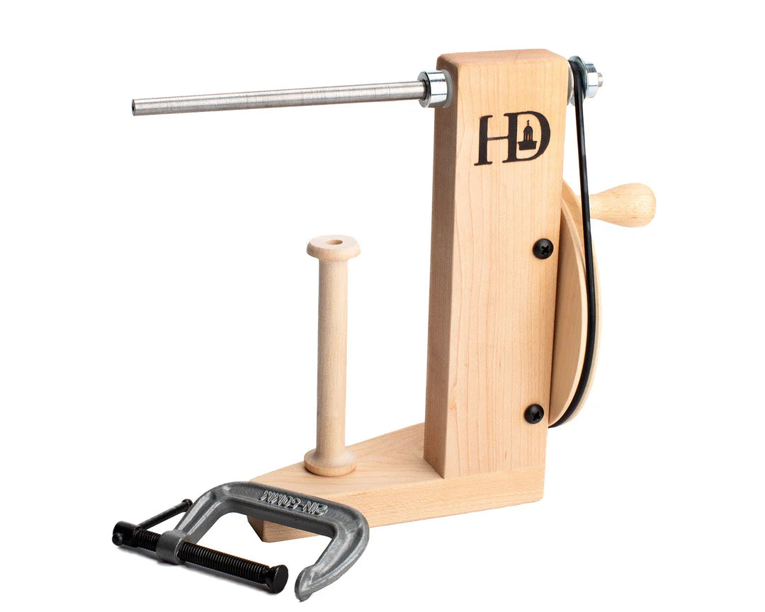 Wooden bobbin winder with clamp and belt