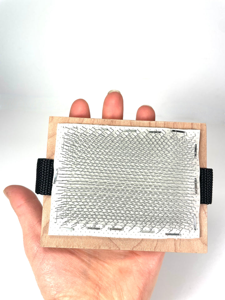 Handheld lock flicker with woven strap