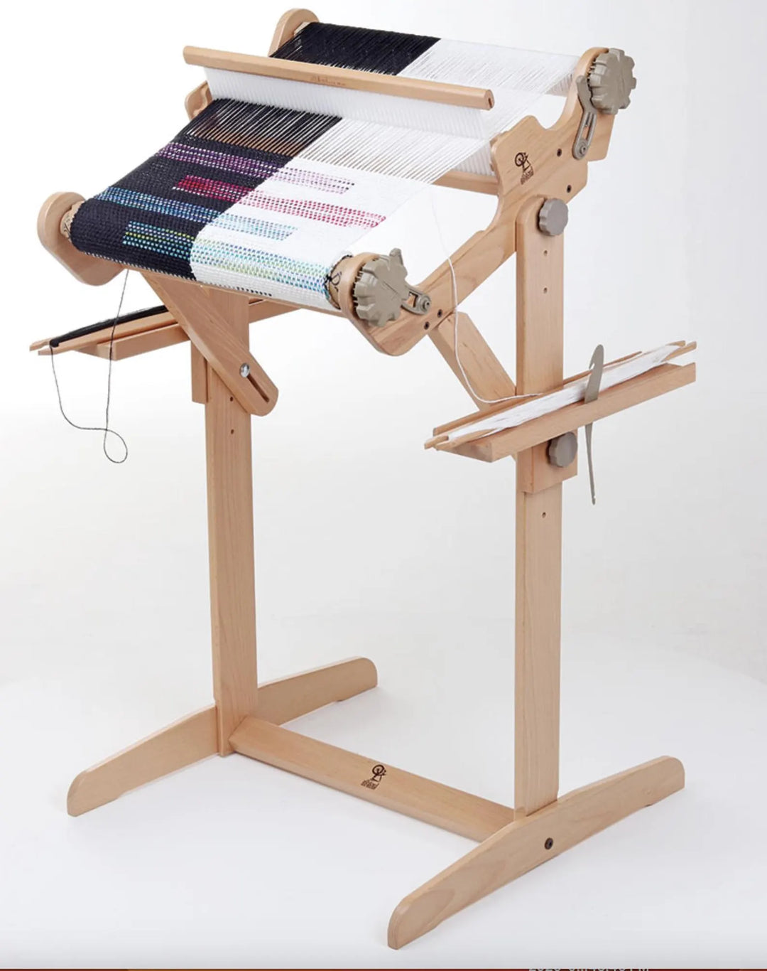 organized weaving workspace with loom trays