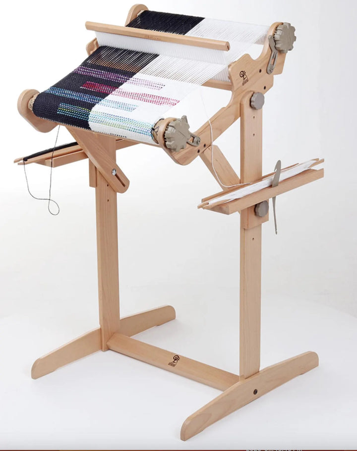 organized weaving workspace with loom trays