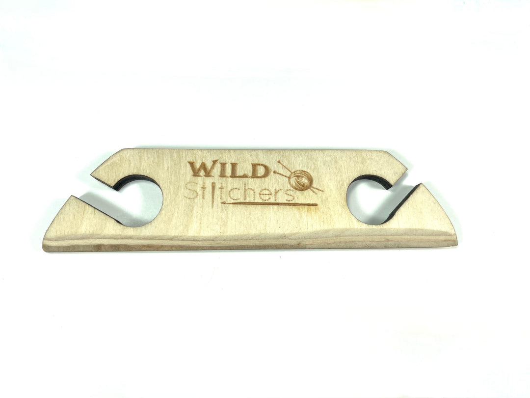 Weaving belt shuttle close-up wood grain