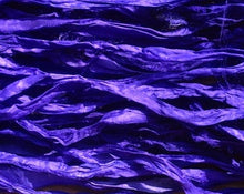 Load image into Gallery viewer, Electric Violet Recycled Sari Silk Ribbon is used in a weaving project, showcasing its versatility in textile arts.
