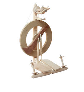 The unfinished Kromski Fantasia spinning wheel presents a blank canvas for fiber artists to personalize. Its innovative design supports a wide range of spinning techniques, making it a dynamic addition to any craft room.