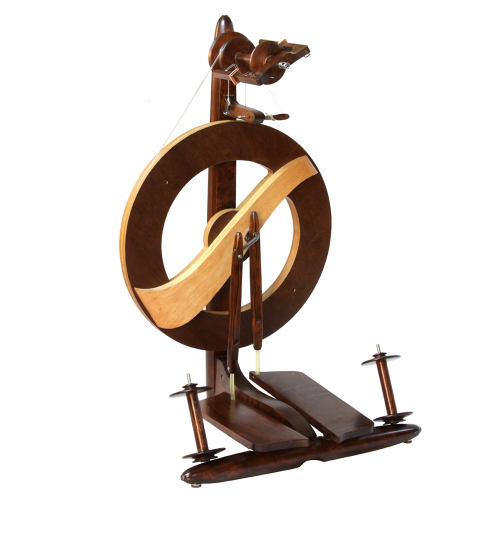 The Kromski Fantasia spinning wheel, with its rich walnut finish, is a statement piece that combines elegance with practicality for the discerning fiber artist. It provides a smooth and effortless spinning experience for all yarn types.