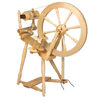 Load image into Gallery viewer, The Kromski Prelude in a clear finish, a spinning wheel crafted for fiber artists, offers a blend of functionality and beauty. Its polished surface and sturdy build provide a reliable spinning experience for creating intricate fiber art.
