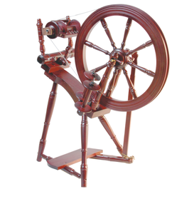 The rich mahogany finish of the Kromski Prelude spinning wheel exudes elegance for fiber artists. Designed for durability, it ensures a smooth spinning process for artisans