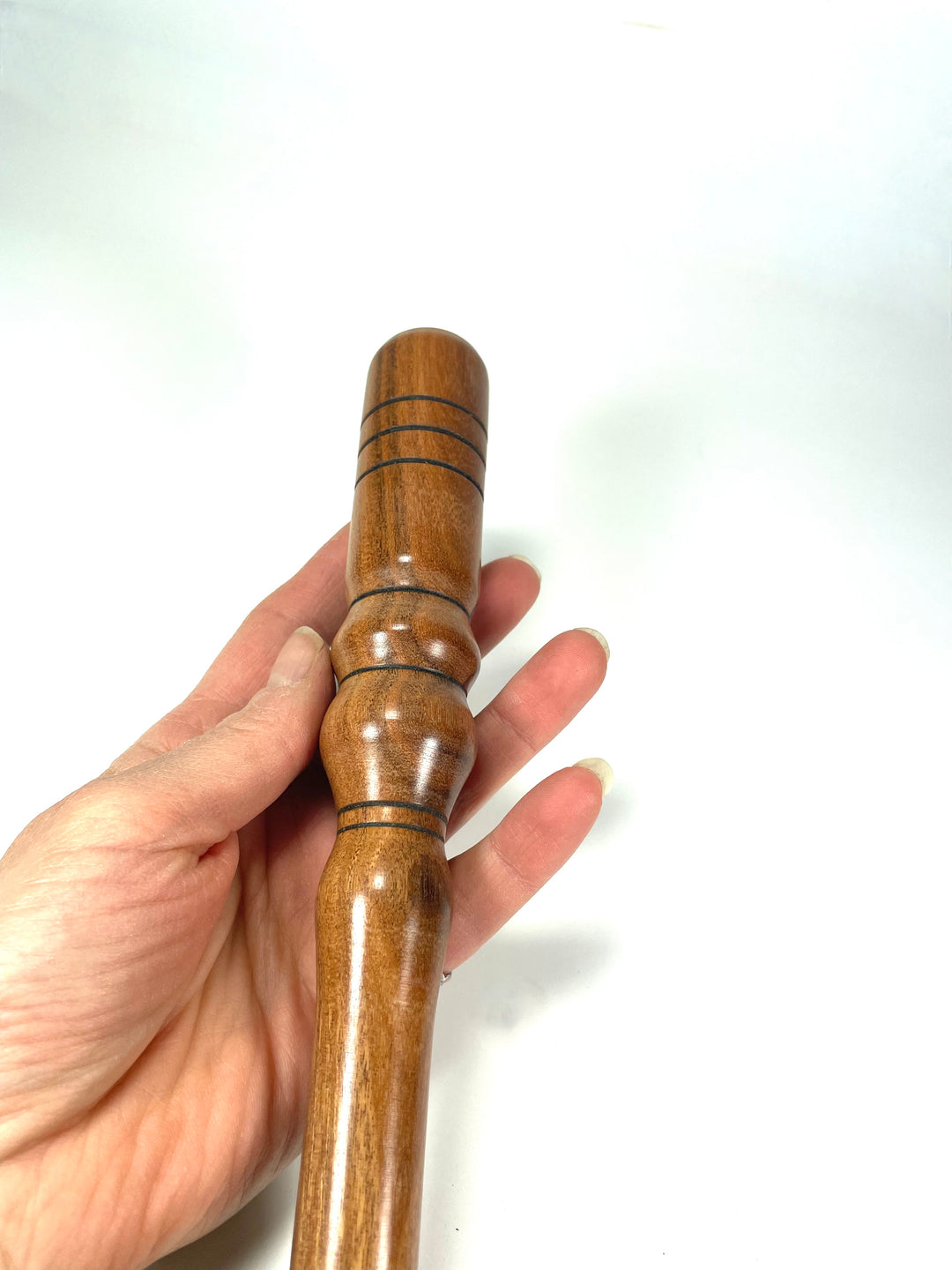 Nostepinne made from exotic hardwood close up