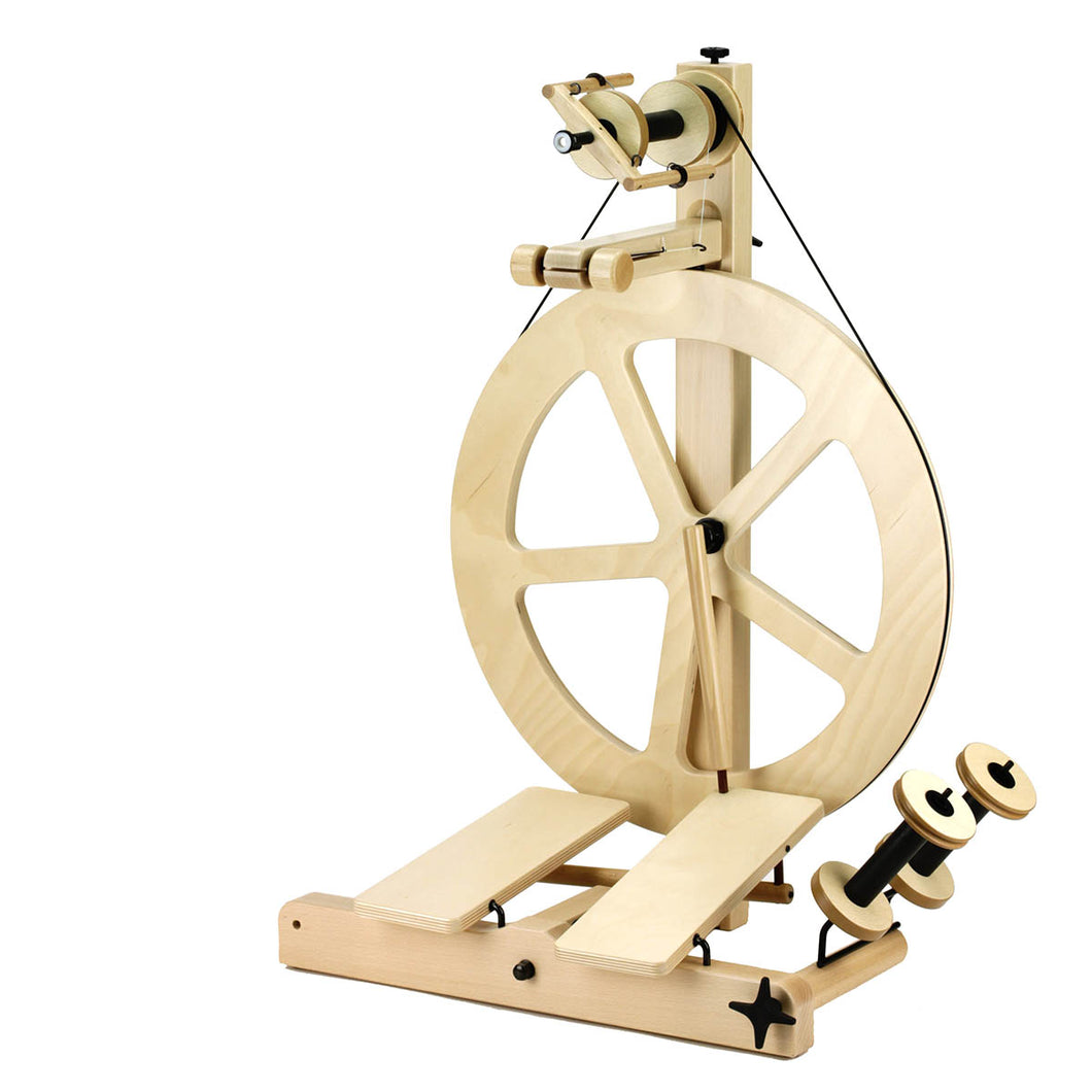 An elegant spinning wheel, the S10 Scotch Tension Dt 5-Spoke Spinning Wheel, designed for precision and versatility in fiber arts.