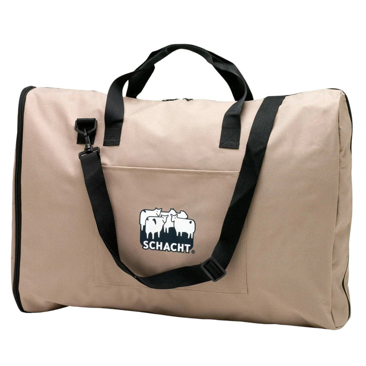 Beige Flip loom carry bag with black straps and Schacht logo on a white background